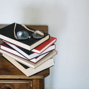 glasses-pile-books