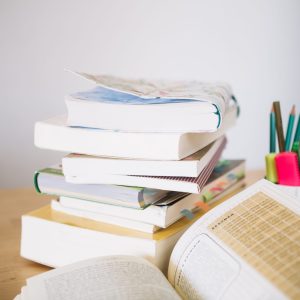 stack-notebooks-cup-with-pencils
